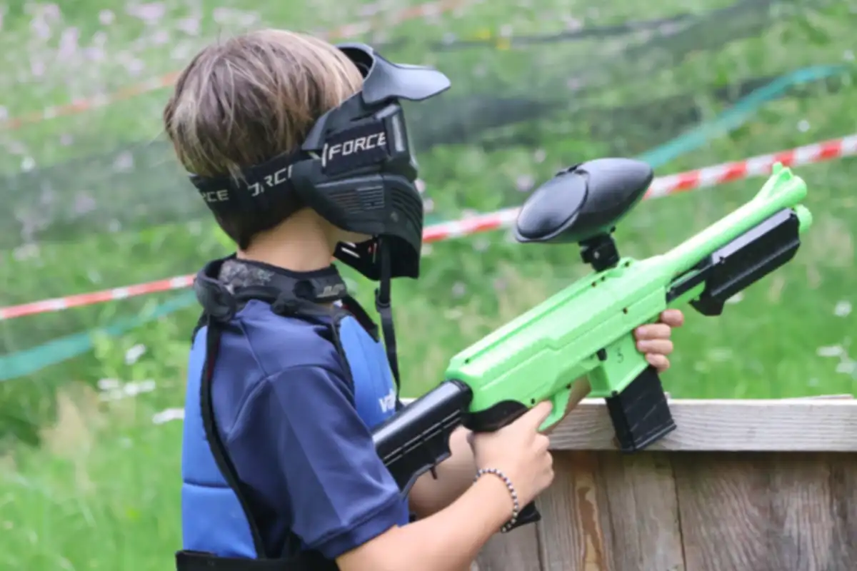 Child Playing Paintball